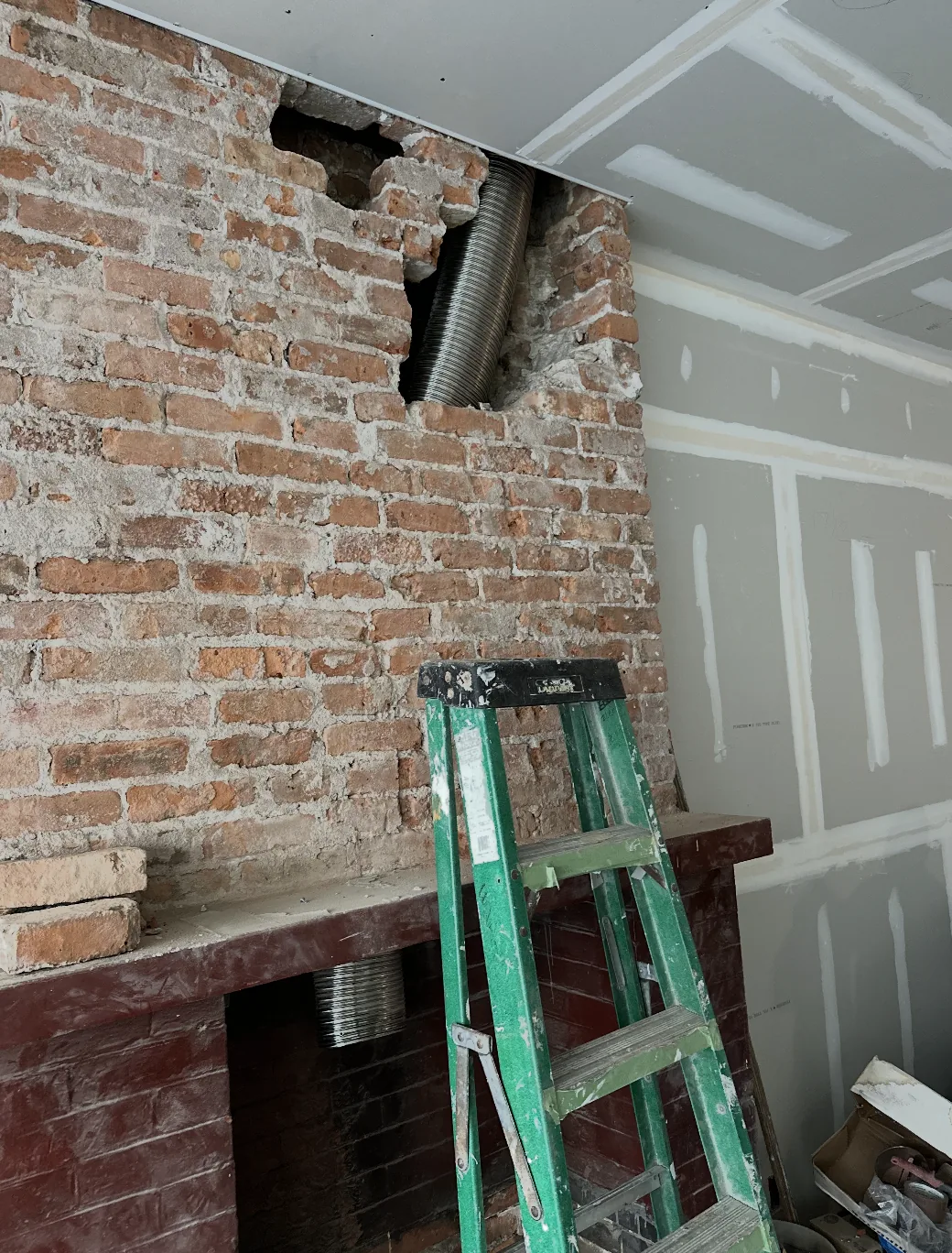 Stainless Steel Chimney Liner Installation for a Fireplace